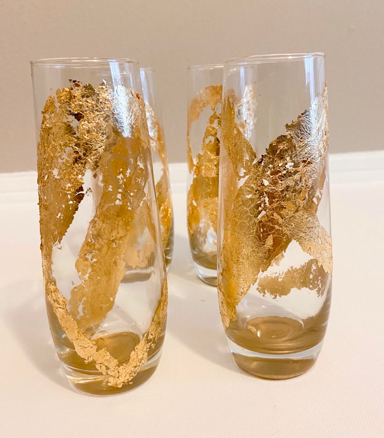 Gilded Oval Crossover Abstract Stemless Champagne Flute